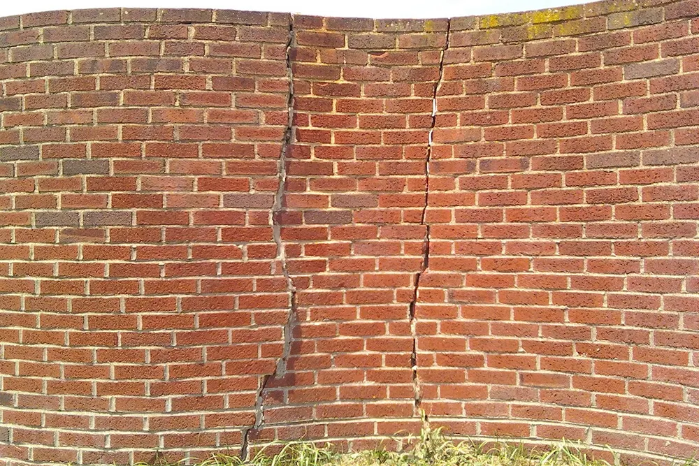 Cracking through wall finishes — can signal movement behind the lining